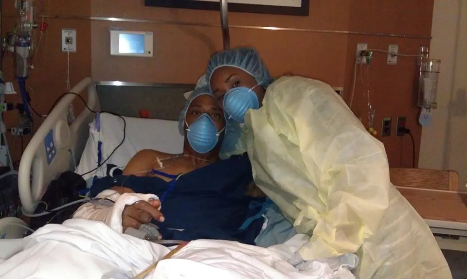 Cedric King in hospital with his wife at his bedside